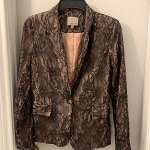 ARIN K.  Lace Blazer size Xs used excellent condition
